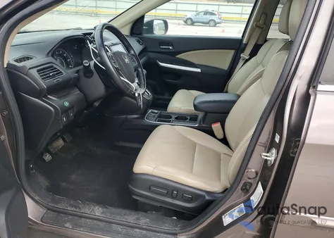 2015 Honda Cr-V Exl z USA, uszkodzony, nr VIN 2HKRM4H71FH694276